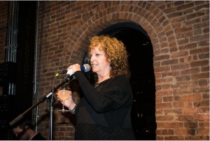 Susan Feldman, president of St. Ann's Warehouse, speaks at the after party. Photo by Rob Abruzzese
