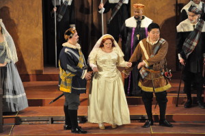 Lucia (Alexis Cregger, center) is unwillingly escorted into the wedding hall. Photo by George Schowerer 