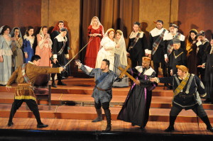 Edgardo (Benjamin Sloman, center) crashes the wedding, leading to a sword fight. Photo by George Schowerer 