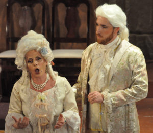 Manon (Sabrina Palladino, left) tells her brother Lescaut (Nathan Matticks, right) that she regrets having given up Des Grieux's love for Geronte's wealth.