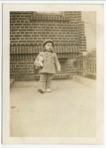 Elliott Gould with teddy bear, in front of 6801 Bay Parkway, early 1940s. Photo courtesy of Elliott Gould