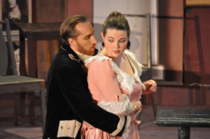 Don Giovanni (Nathan Matticks) tries to seduce Zerlina (Hannah Stone) Photo by George Showerer