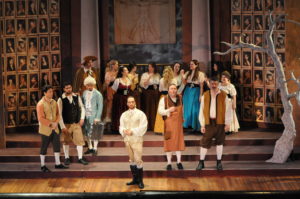 Don Giovanni (center, in white) surrounded by villagers. Photo by George Showerer.